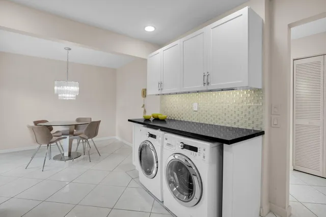 a view of a kitchen and dining room