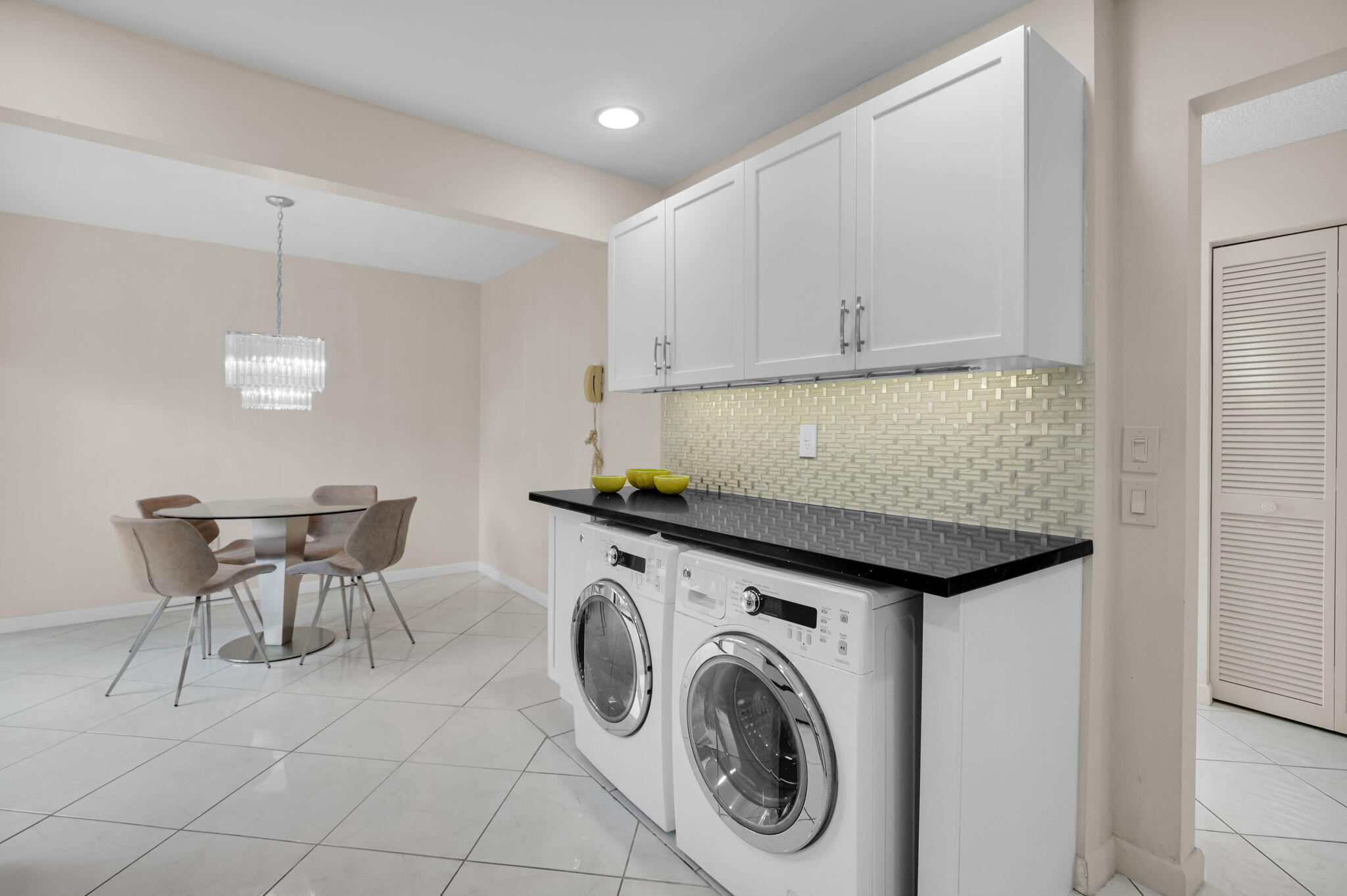 12 Westgate Lane, Unit C Boynton Beach, FL 33436 - Photo 8 of 54 a view of a kitchen and dining room