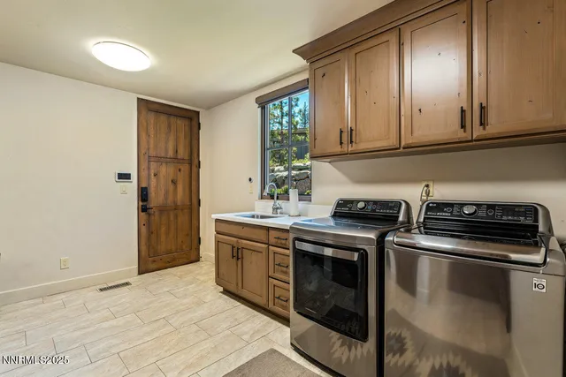 a kitchen with stainless steel appliances granite countertop a stove and a refrigerator