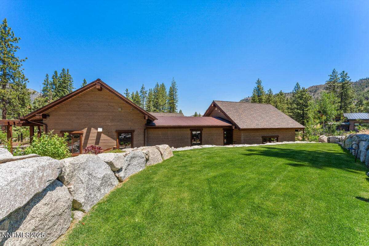 253 Mill Race Loop Carson City, NV 89705 - Photo 23 of 44 a front view of house with yard and green space