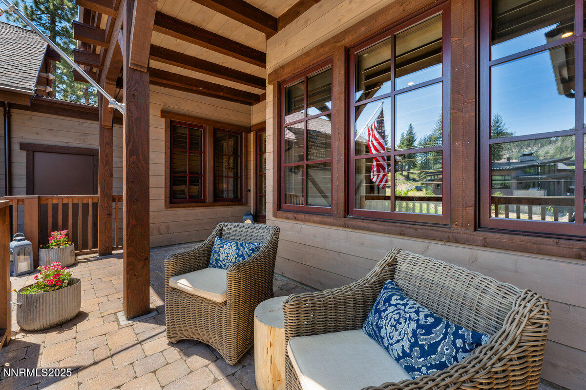 253 Mill Race Loop Carson City, NV 89705 - Photo 25 of 44 a building outdoor space with patio furniture and potted plants
