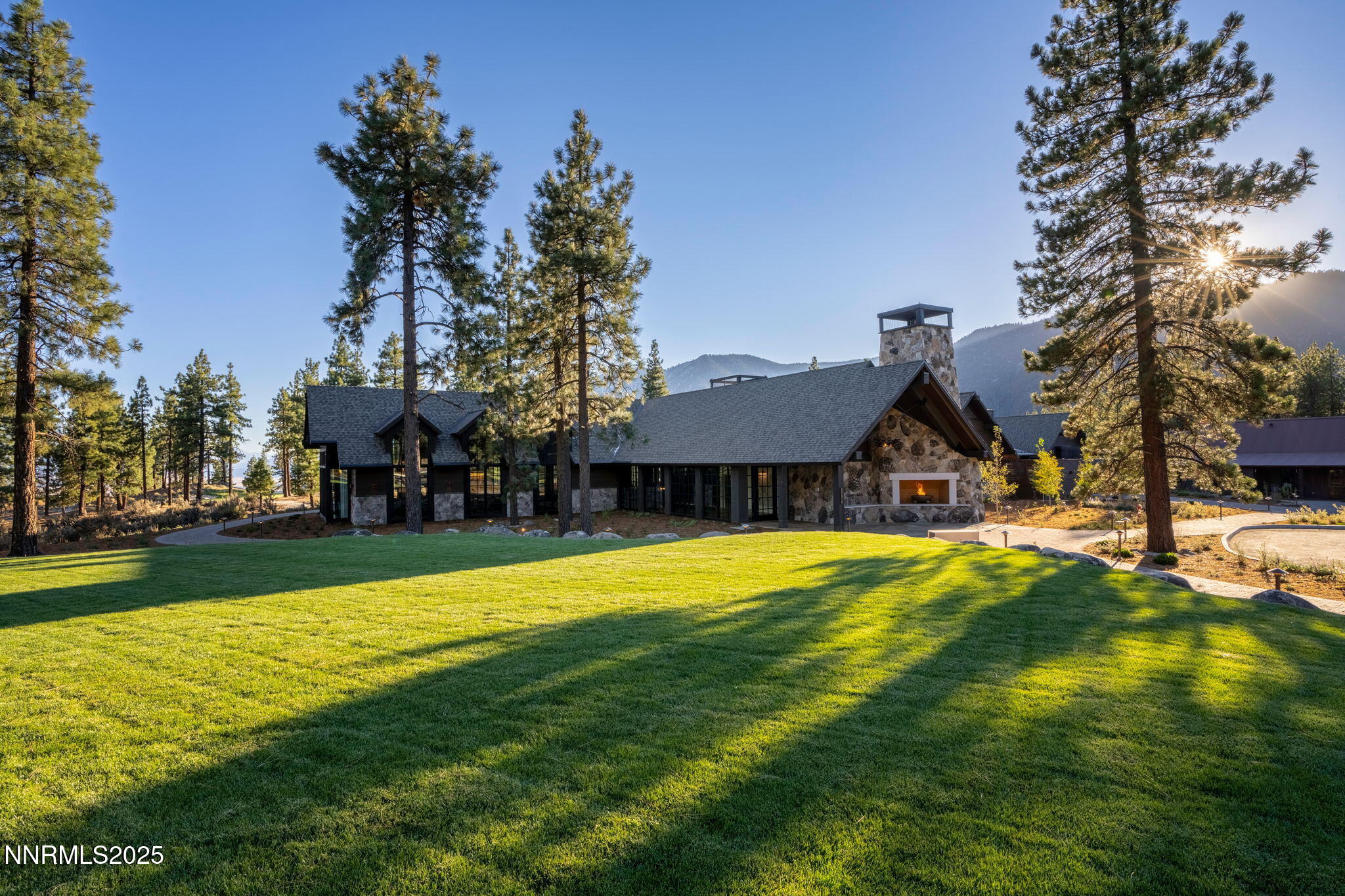 253 Mill Race Loop Carson City, NV 89705 - Photo 28 of 44 a view of a house with a yard patio and swimming pool