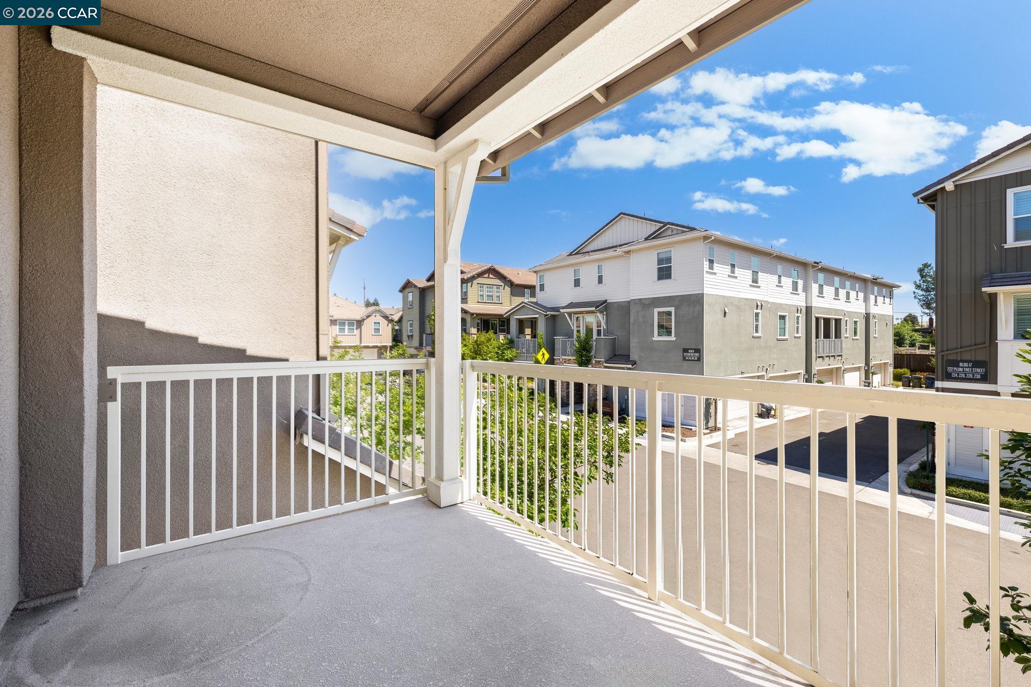205 Plum Tree Street Livermore, CA 94551 - Photo 22 of 47 a view of a large building from a balcony
