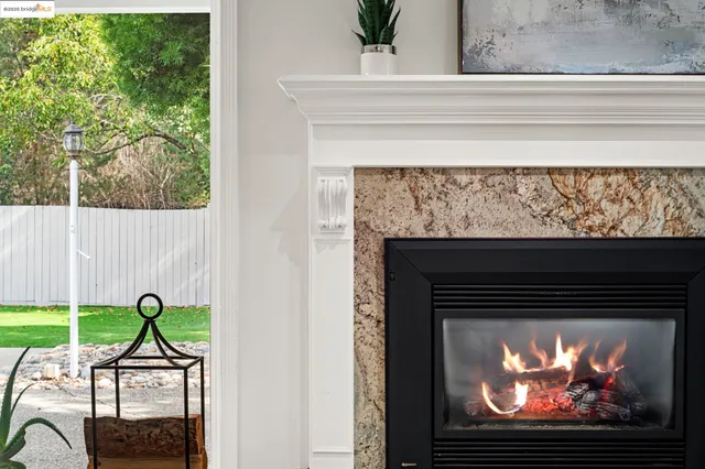 a kitchen with stainless steel appliances granite countertop a sink and a stove top oven