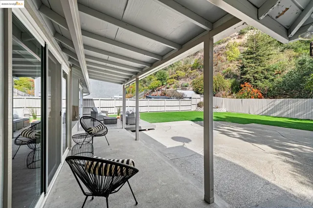 a front view of house with yard and seating area
