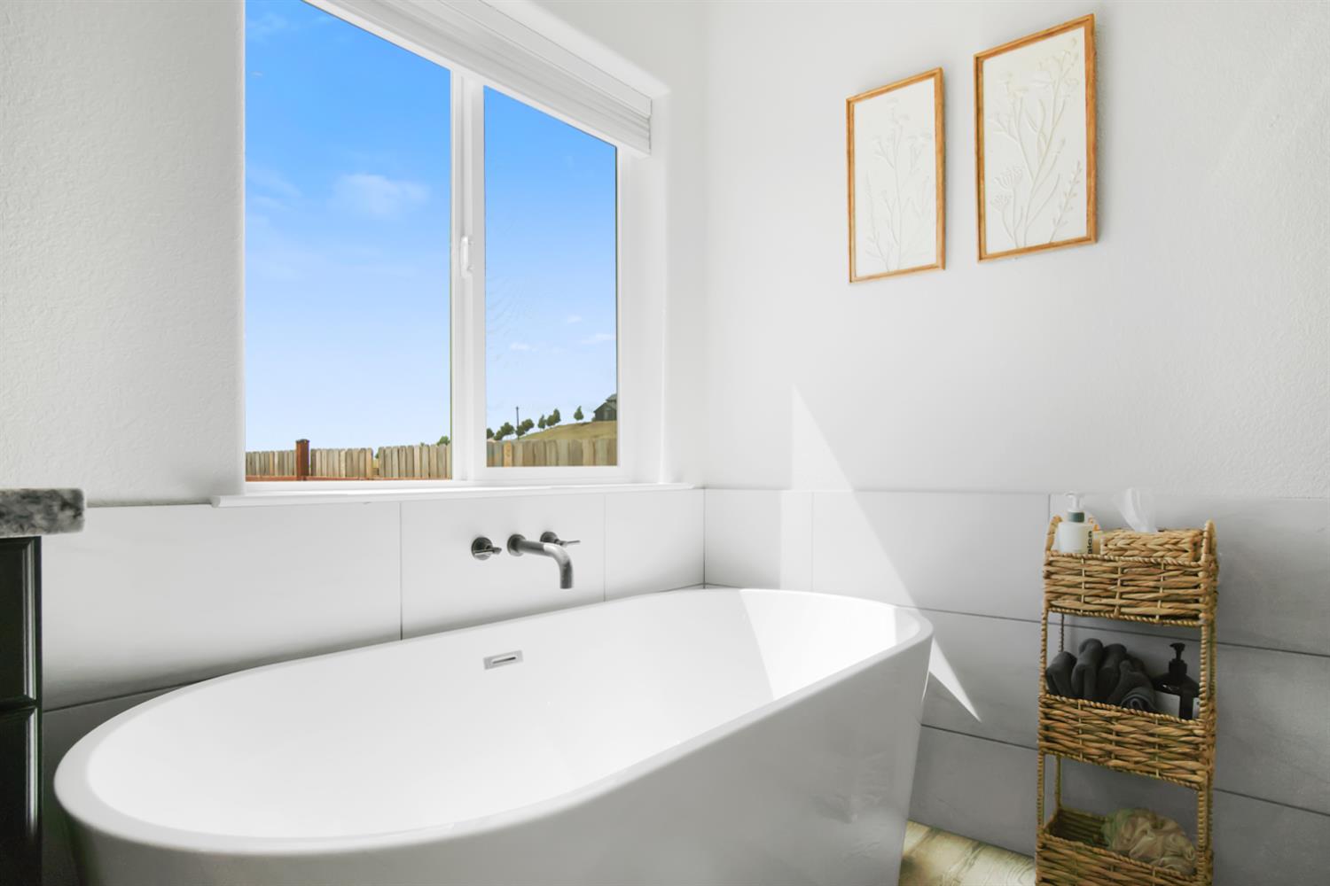 7991 South Shingle Road Shingle Springs, CA 95682 - Photo 25 of 58 a bathroom with a bathtub and a sink