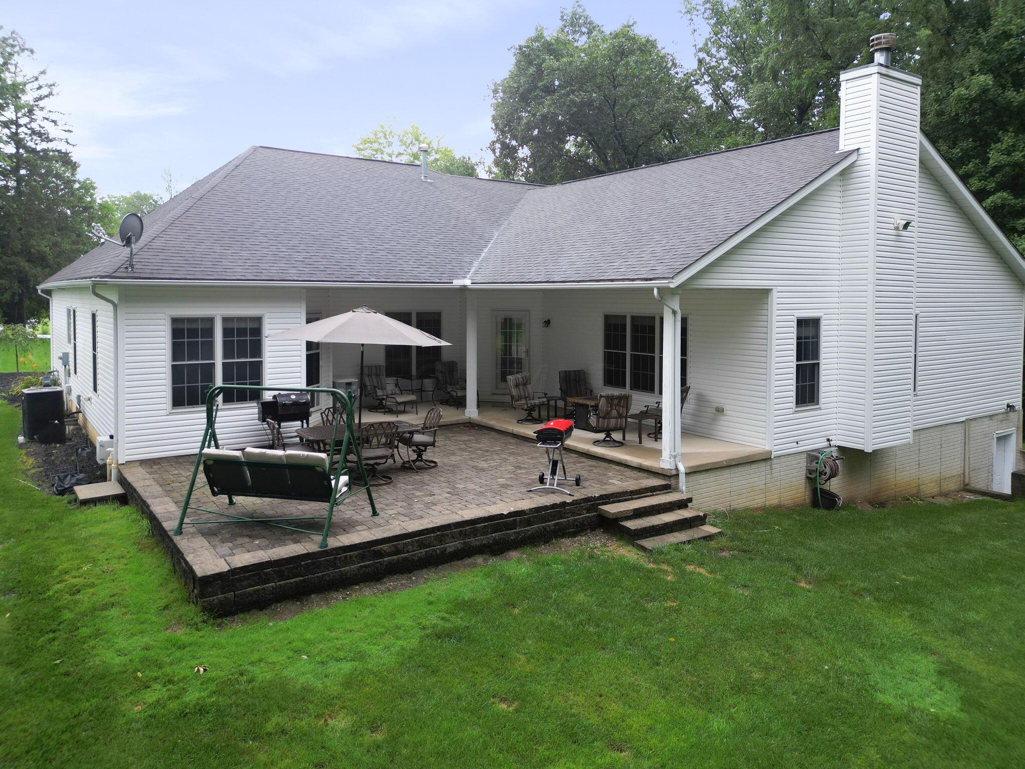 3255 Liberty Road Delaware, OH 43015 - Photo 56 of 69 Elevated Paver Patio with Covered Porch