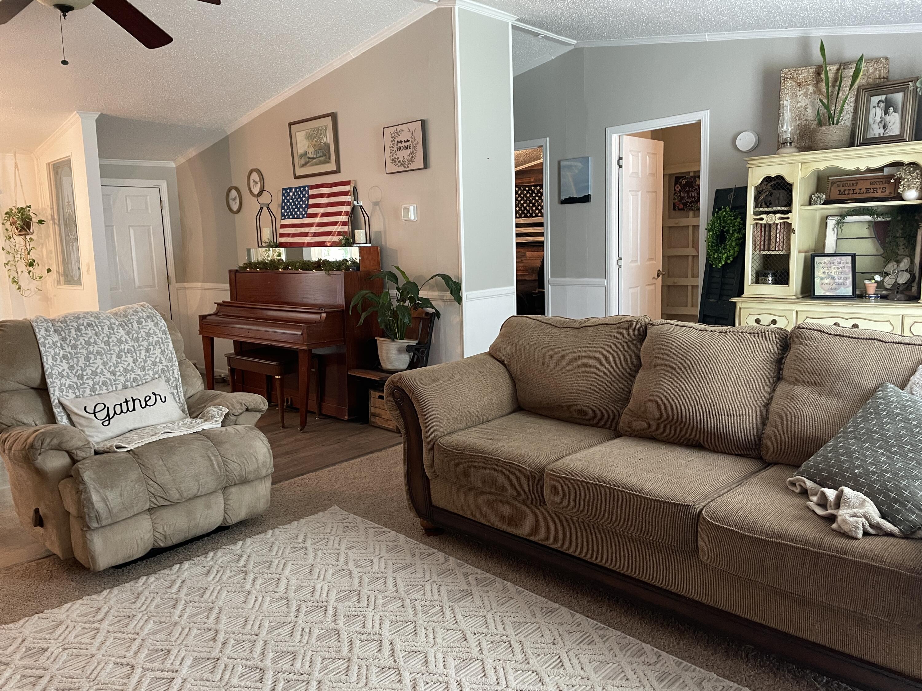 2166 Healing Springs Road Blackville, SC 29817 - Photo 6 of 43 a living room with furniture and a piano
