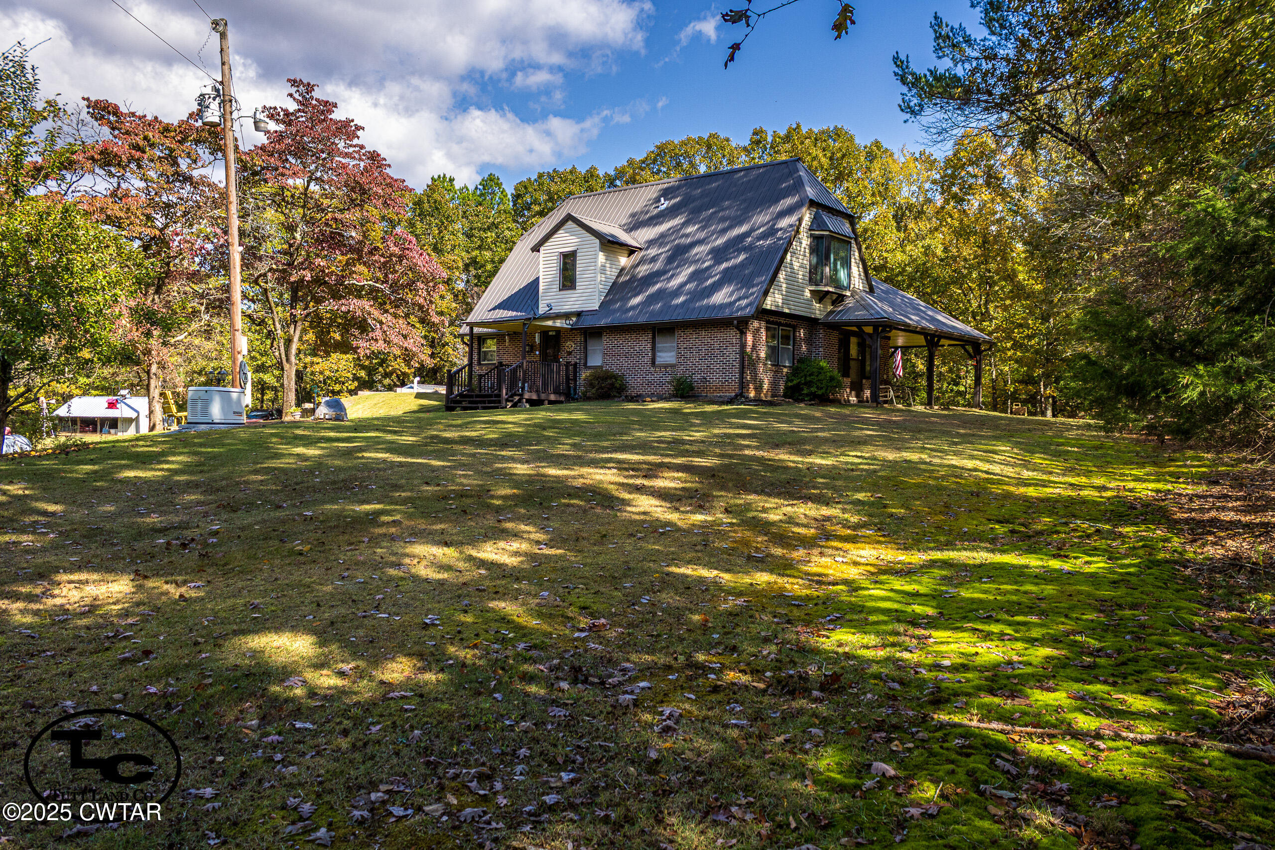 3964 Center Hill Road Finger, TN 38334 - Photo 11 of 31 a front view of a house with a big yard