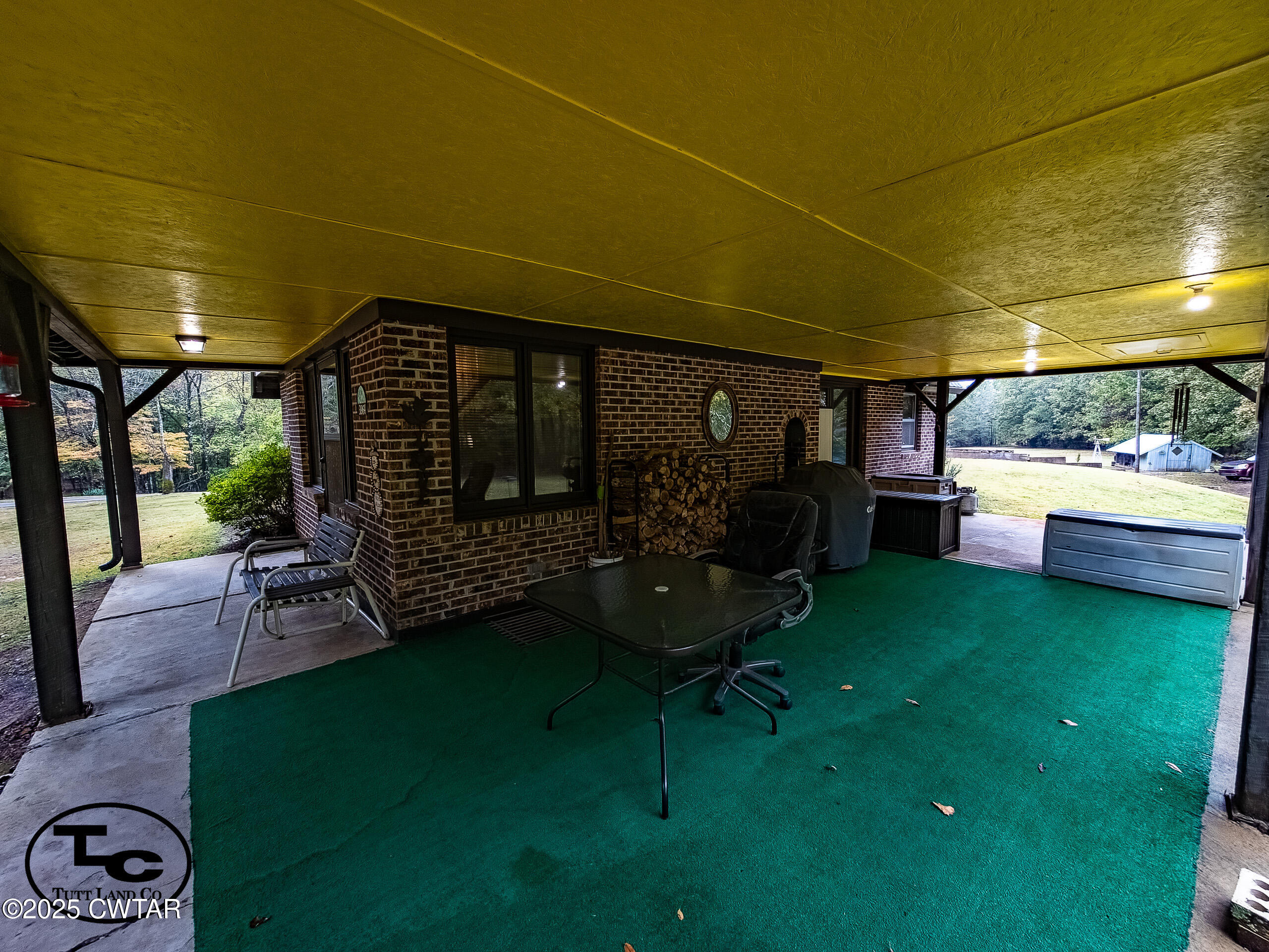 3964 Center Hill Road Finger, TN 38334 - Photo 16 of 31 a view of a backyard with garden and patio