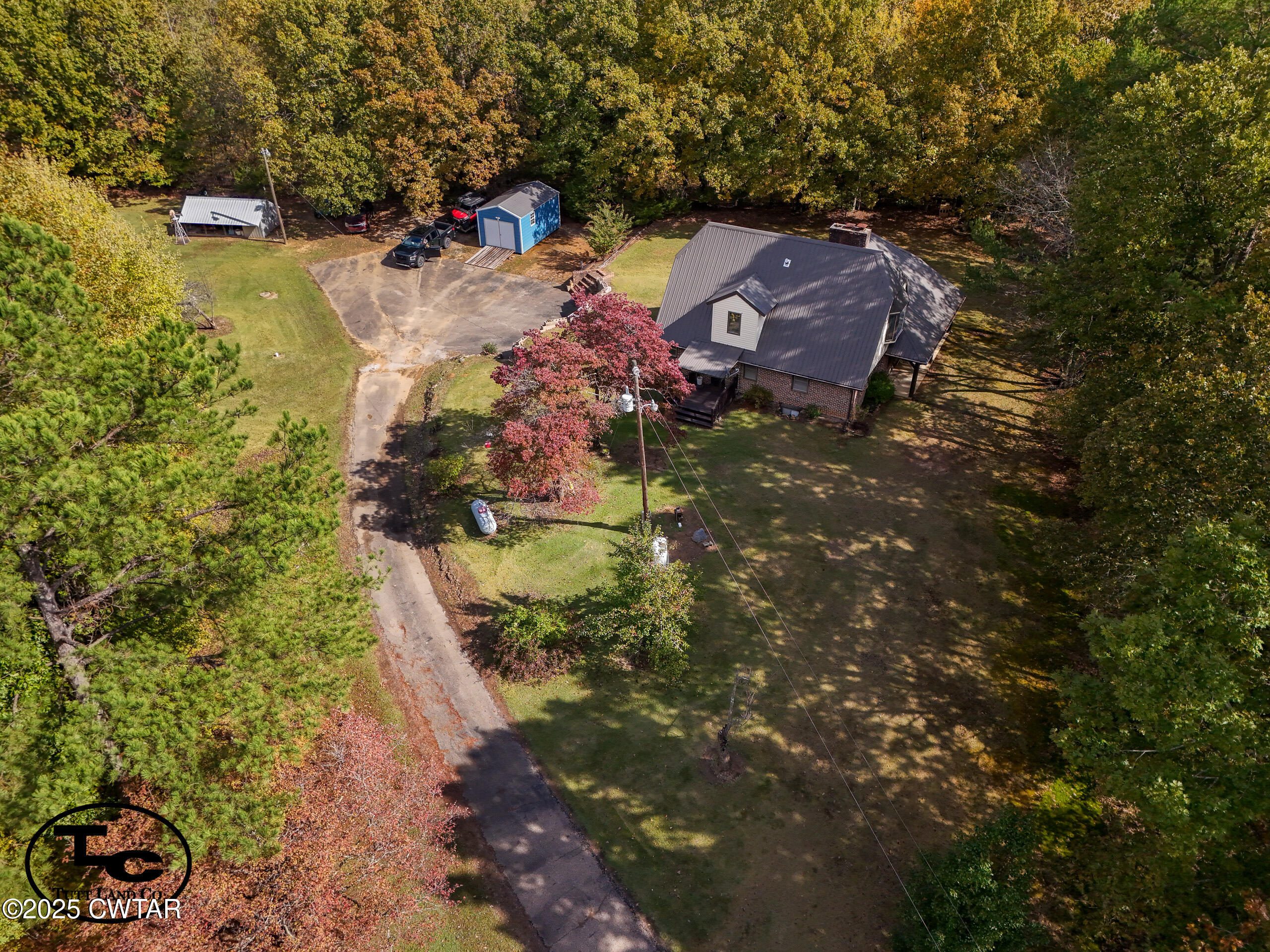 3964 Center Hill Road Finger, TN 38334 - Photo 30 of 31 a view of a house with a yard
