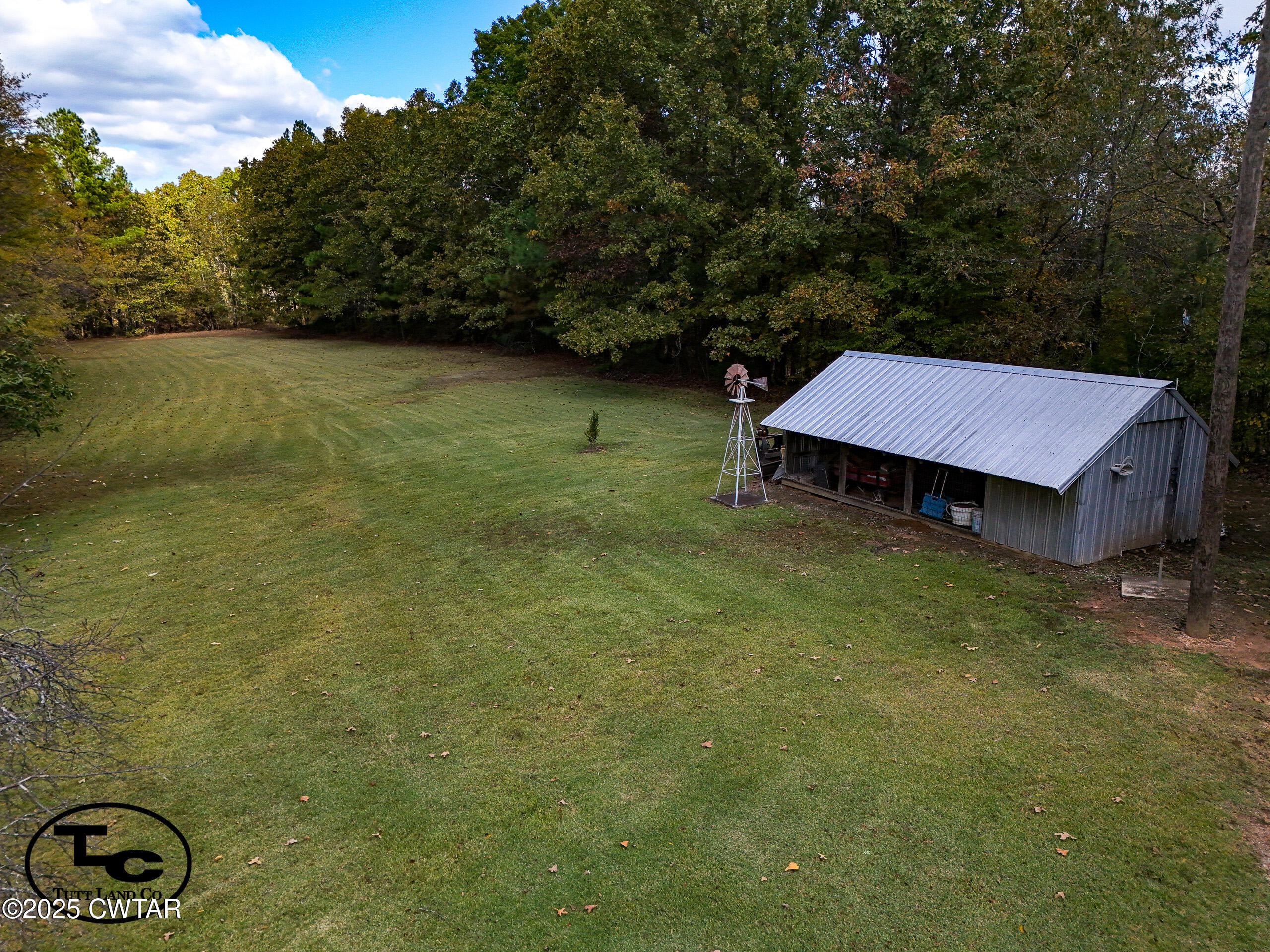 3964 Center Hill Road Finger, TN 38334 - Photo 4 of 31 a view of a house with a backyard