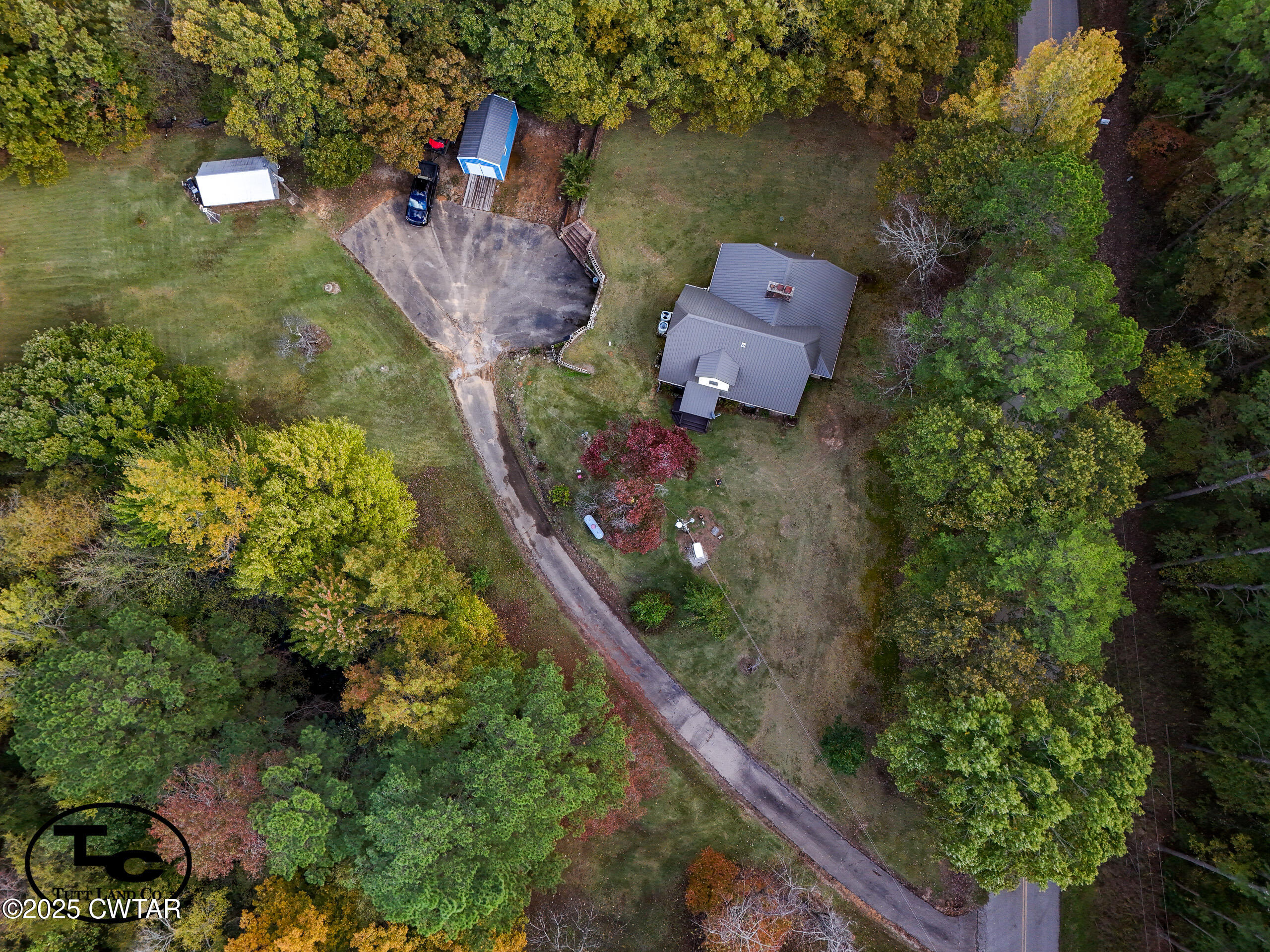 3964 Center Hill Road Finger, TN 38334 - Photo 7 of 31 an aerial view of a house with a yard