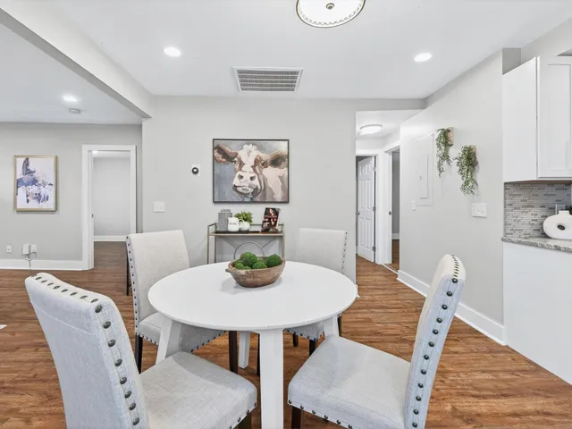 a view of a dining room with furniture