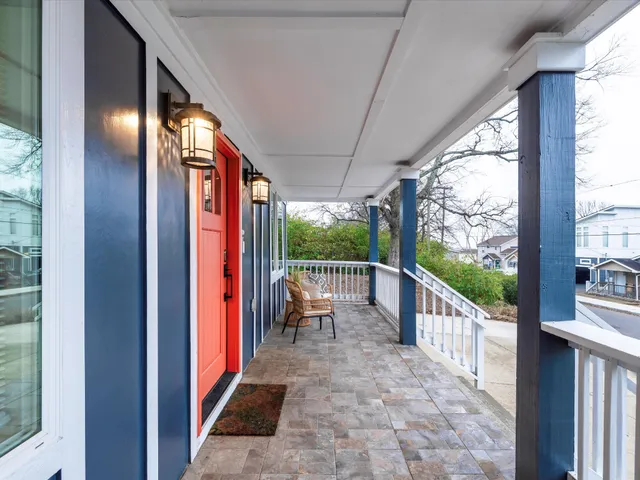 a view of two chairs in balcony