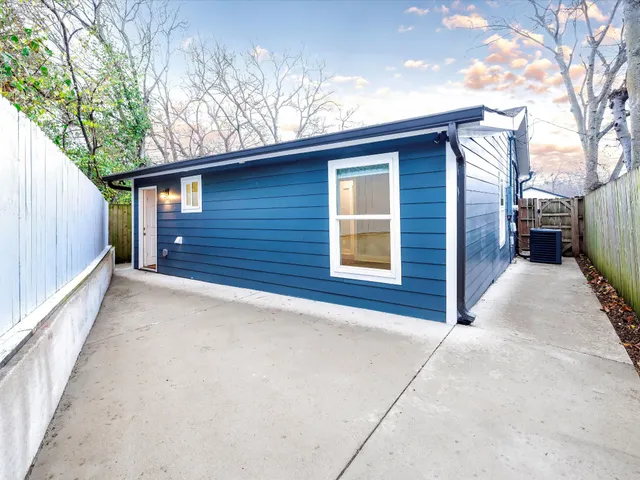 a view of backyard of house