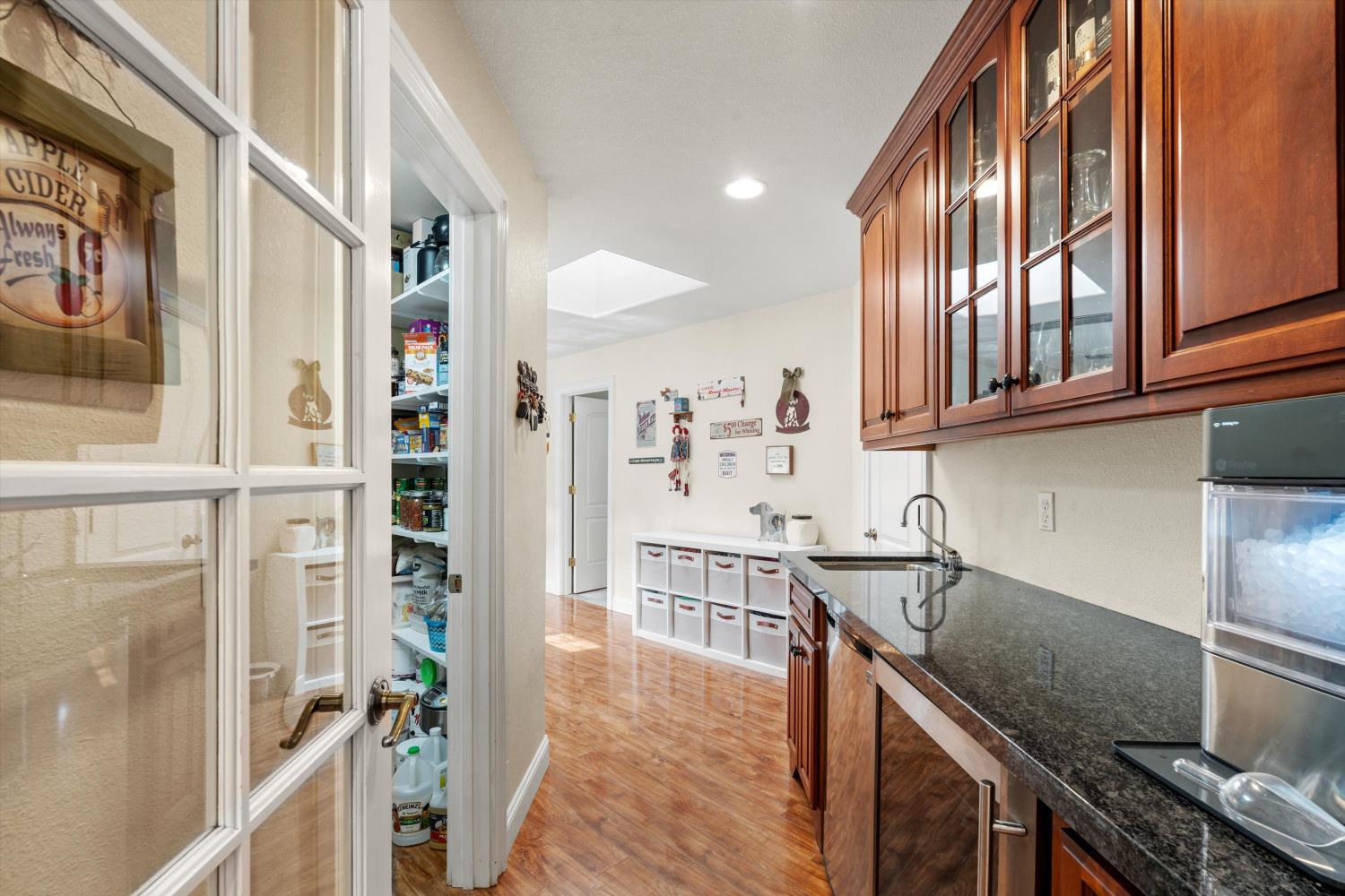 2661 Oak Ln Drive Rescue, CA 95672 - Photo 16 of 69 a kitchen with stainless steel appliances granite countertop a sink stove and cabinets
