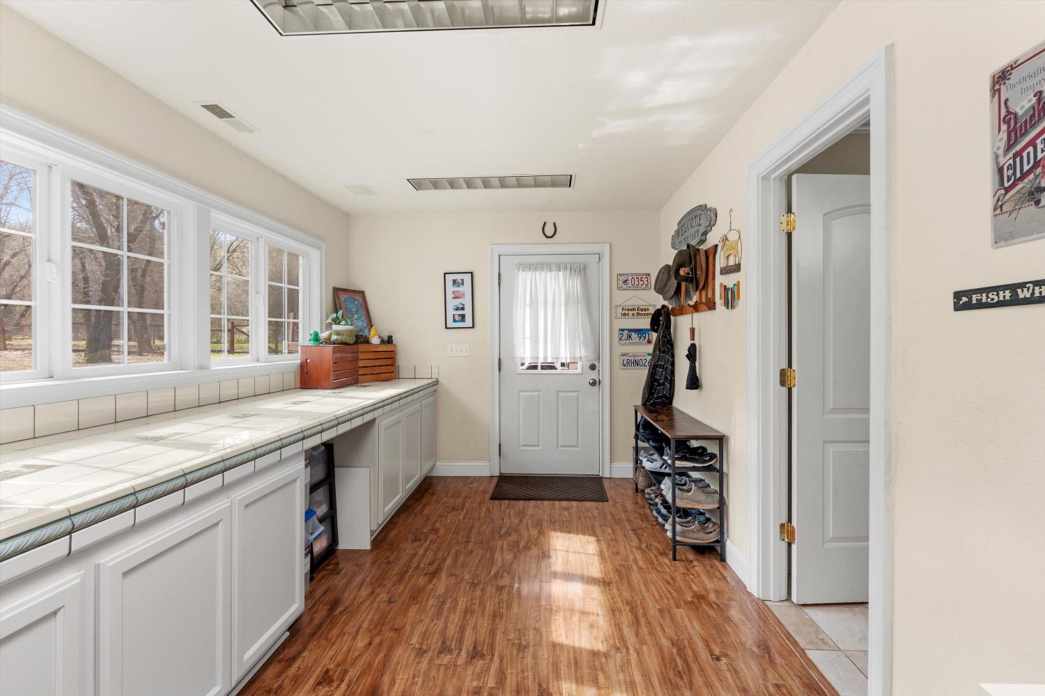 2661 Oak Ln Drive Rescue, CA 95672 - Photo 17 of 69 a kitchen with a sink and wooden floor