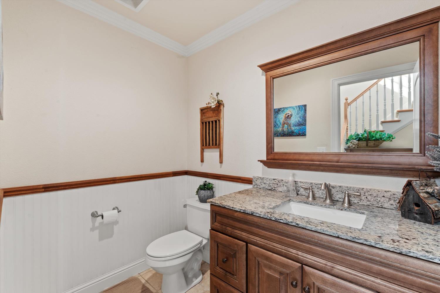 2661 Oak Ln Drive Rescue, CA 95672 - Photo 25 of 69 a bathroom with a granite countertop sink and a mirror