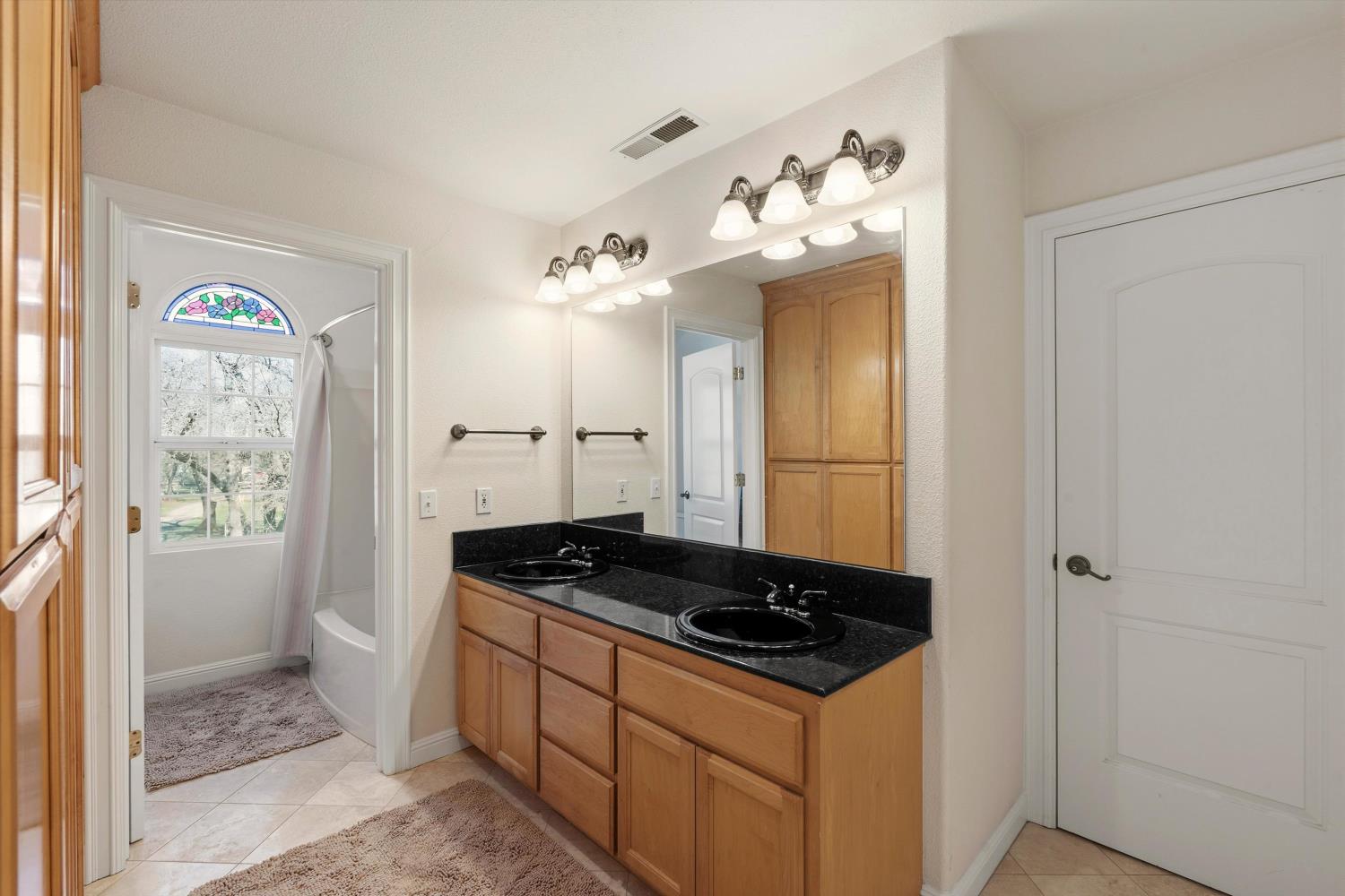 2661 Oak Ln Drive Rescue, CA 95672 - Photo 34 of 69 a kitchen with a sink stove and refrigerator