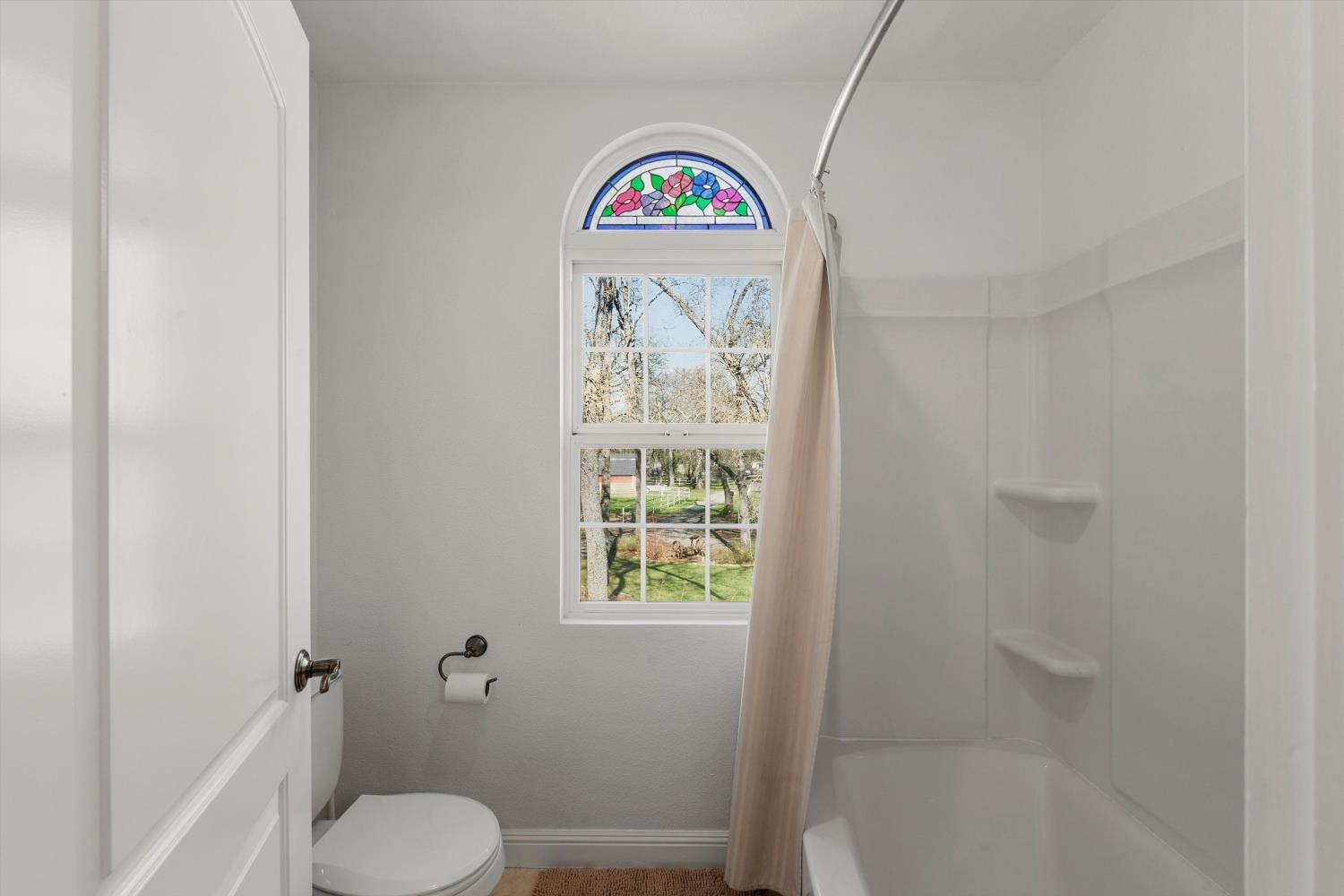 2661 Oak Ln Drive Rescue, CA 95672 - Photo 35 of 69 a view of bathroom with a window and a shower