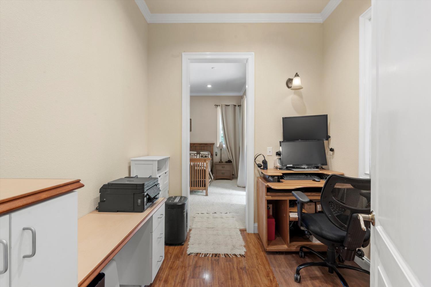 2661 Oak Ln Drive Rescue, CA 95672 - Photo 38 of 69 a view of a workspace with furniture and wooden floor