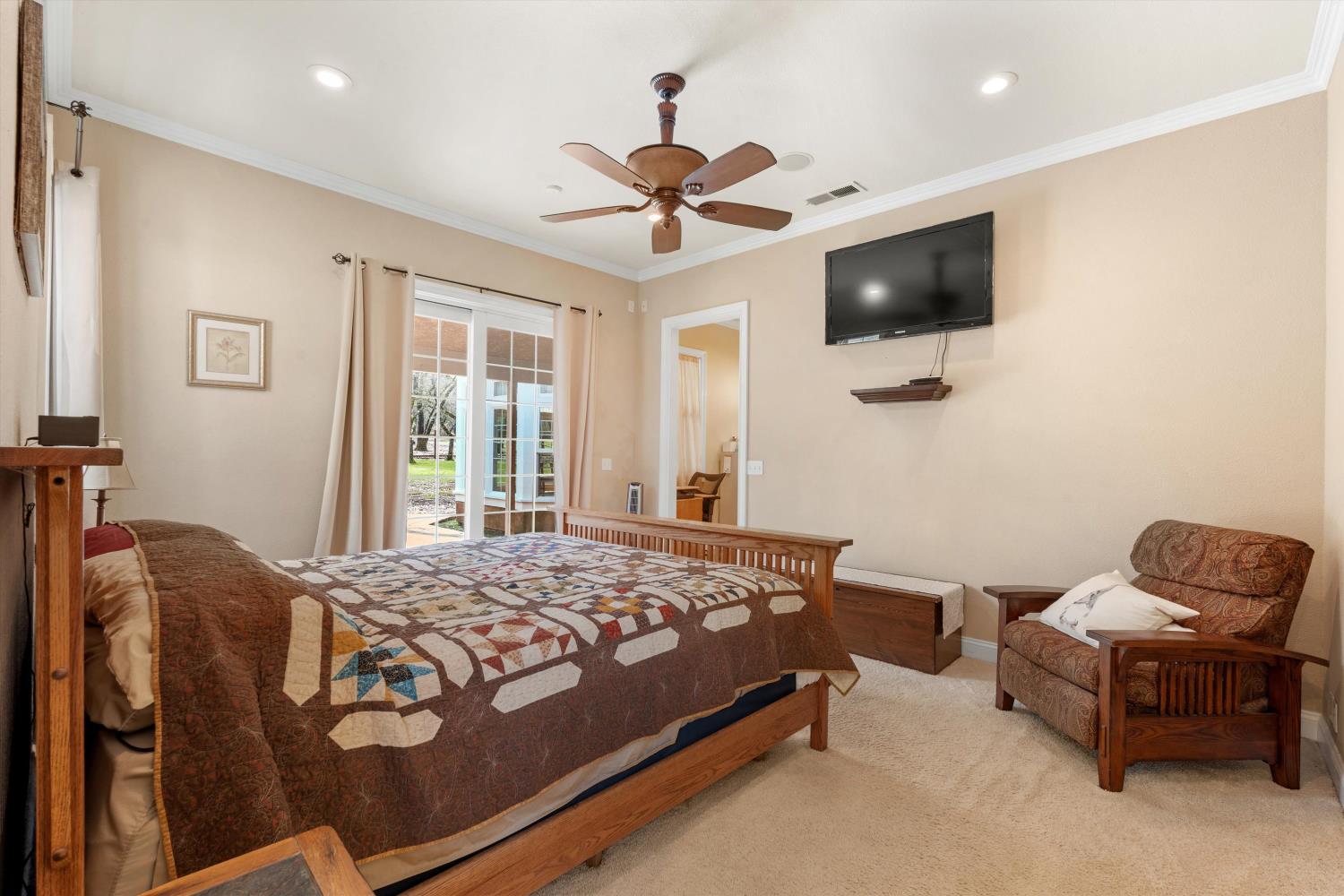 2661 Oak Ln Drive Rescue, CA 95672 - Photo 40 of 69 a bedroom with a bed and a flat screen tv