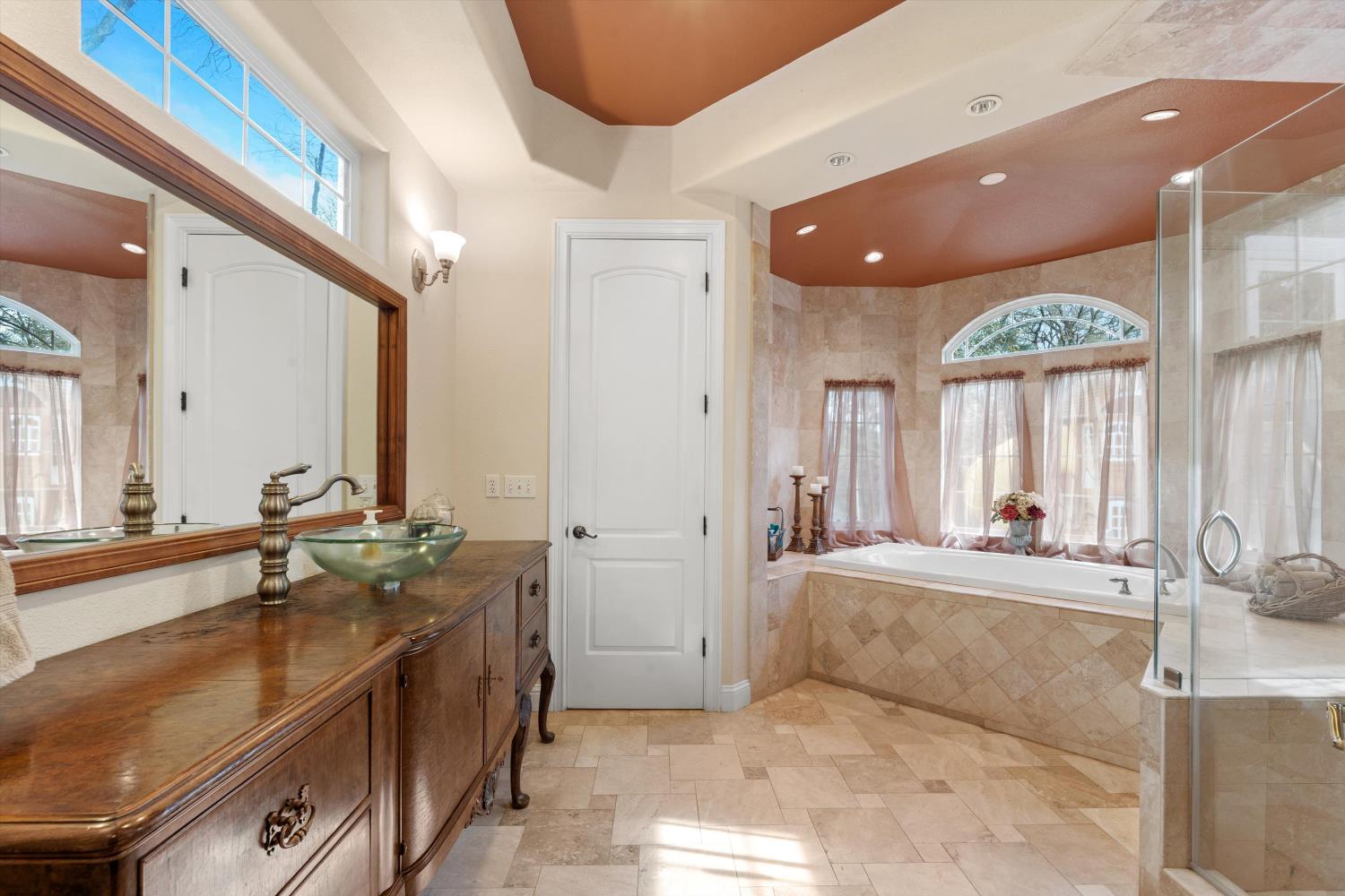 2661 Oak Ln Drive Rescue, CA 95672 - Photo 41 of 69 a large bathroom with a large tub and sink