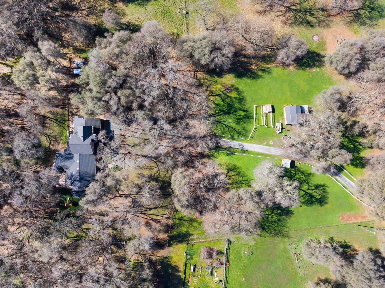 2661 Oak Ln Drive Rescue, CA 95672 - Photo 63 of 69 an aerial view of house with yard swimming pool and outdoor seating