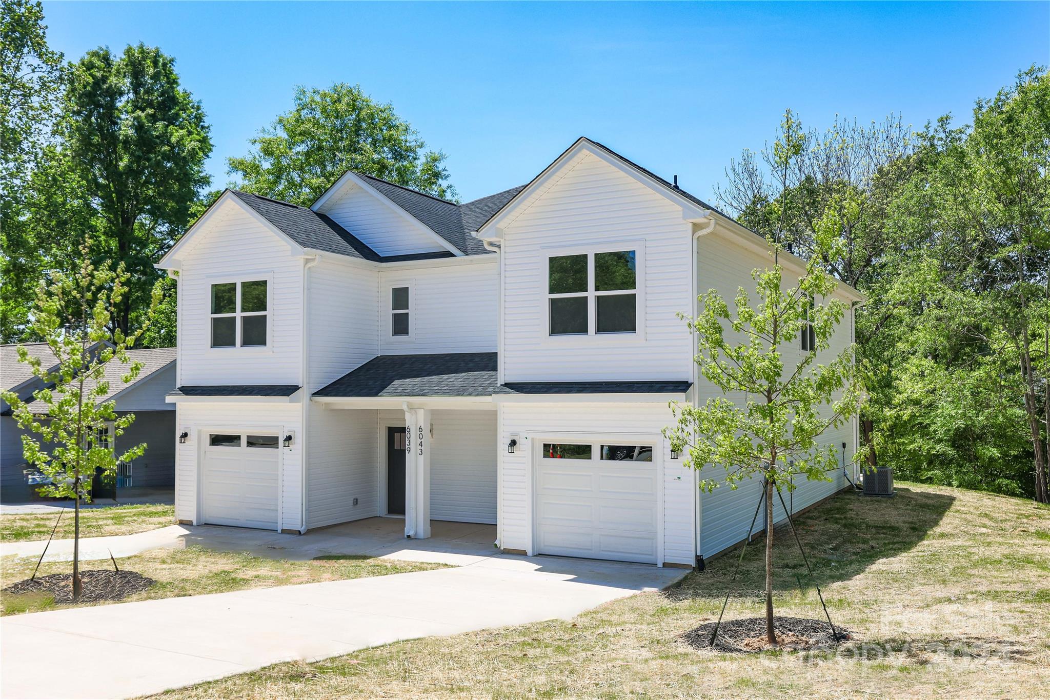 4317 Perkins Road Charlotte, NC 28269 - Photo 29 of 29 a view of a house with a garden