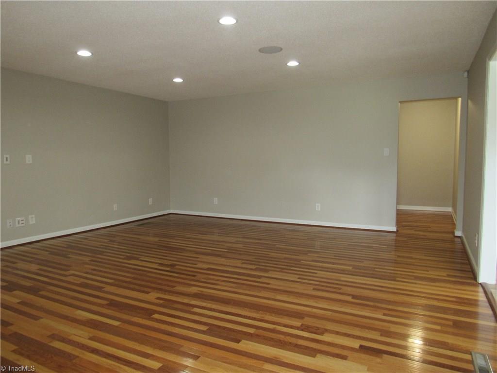 306 Summit Road High Point, NC 27265 - Photo 12 of 27 From the living room you'll find all the bedrooms off the back hallway.