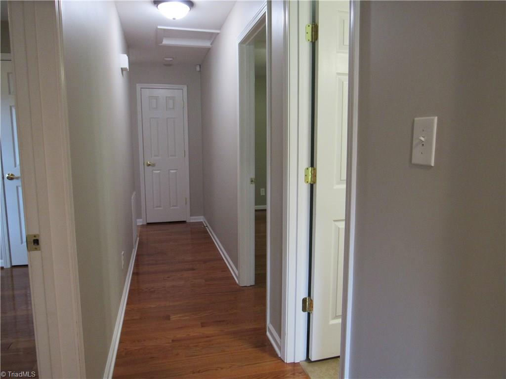 306 Summit Road High Point, NC 27265 - Photo 13 of 27 Back hallway to bedrooms and baths.