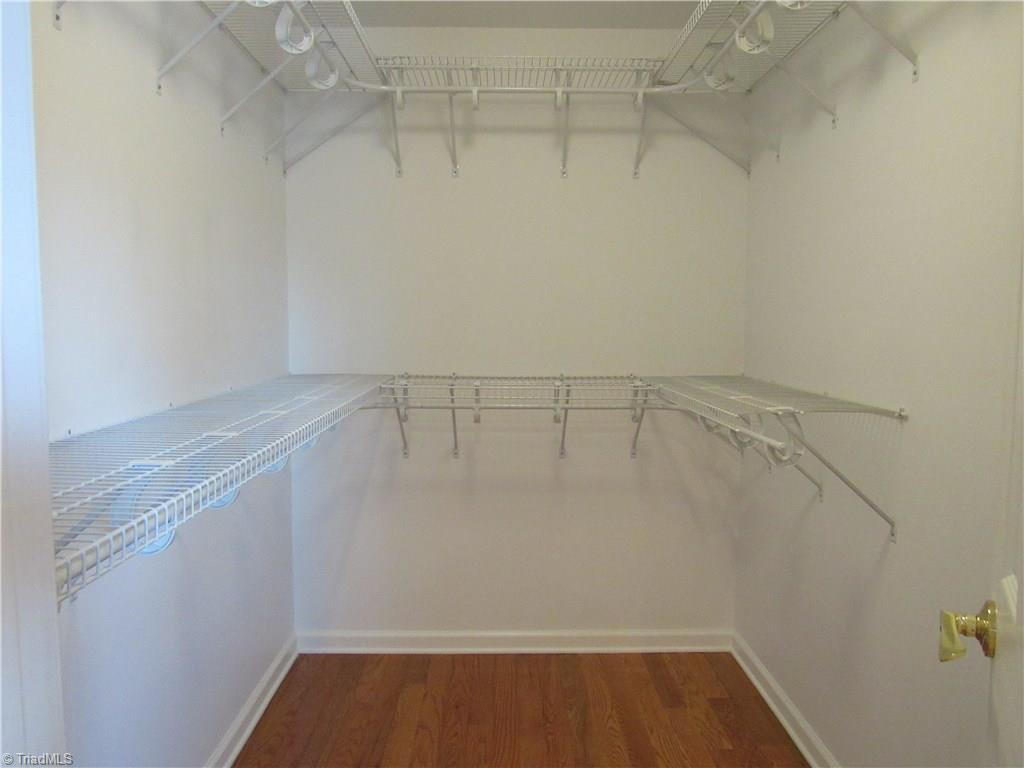 306 Summit Road High Point, NC 27265 - Photo 18 of 27 Master walk-in closet.