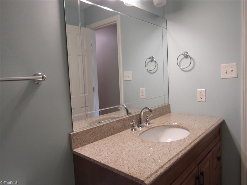 306 Summit Road High Point, NC 27265 - Photo 22 of 27 A look at the vanity in the hall bath.