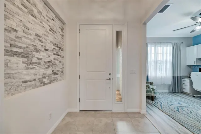 a view of livingroom with hardwood floor and a flat screen tv