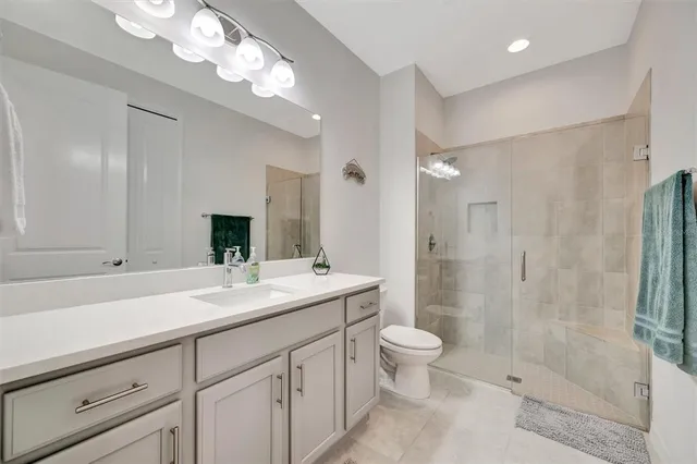a bathroom with a shower and a bathtub