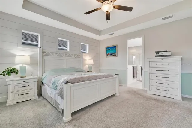 a bathroom with 2 sink tub and a mirror