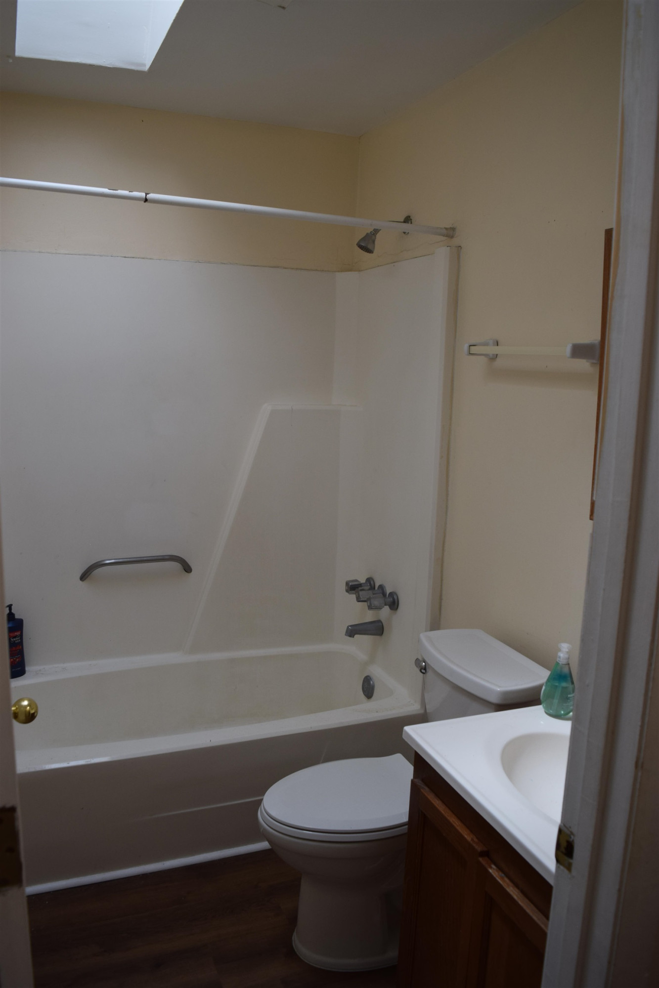 2912 Okelly Street Raleigh, NC 27607 - Photo 10 of 11 a bathroom with a sink a toilet and a bathtub