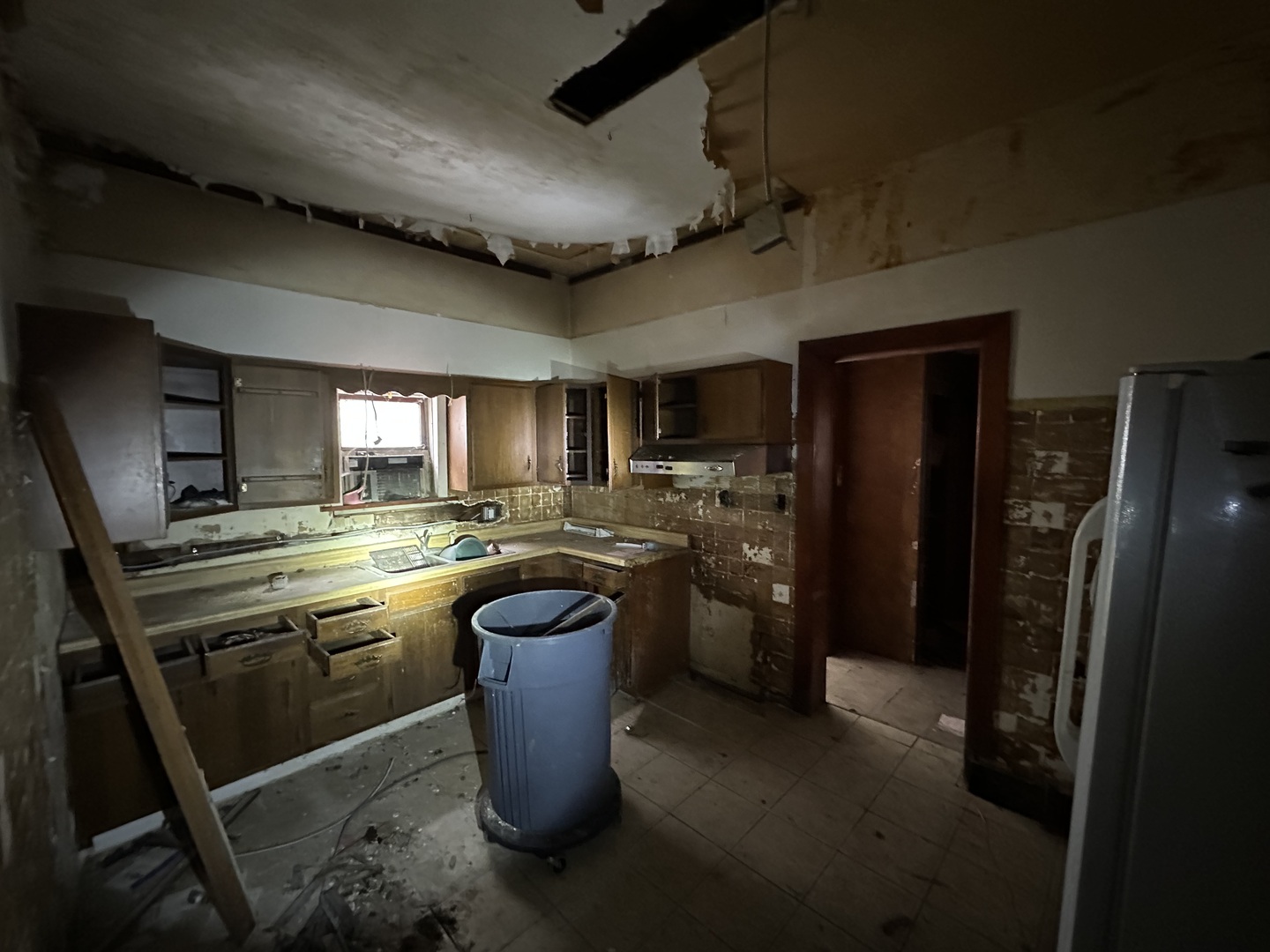 2921 East 78th Place Chicago, IL 60649 - Photo 6 of 18 a kitchen with stainless steel appliances granite countertop a sink stove and refrigerator