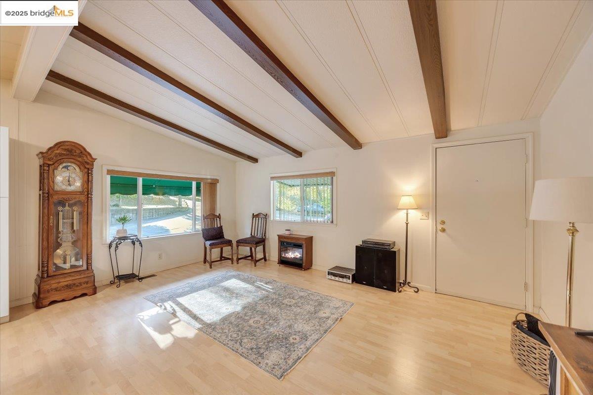 14192 Tuolumne Road, Unit 67 Sonora, CA 95370 - Photo 16 of 26 a view of a livingroom with furniture window and a fireplace