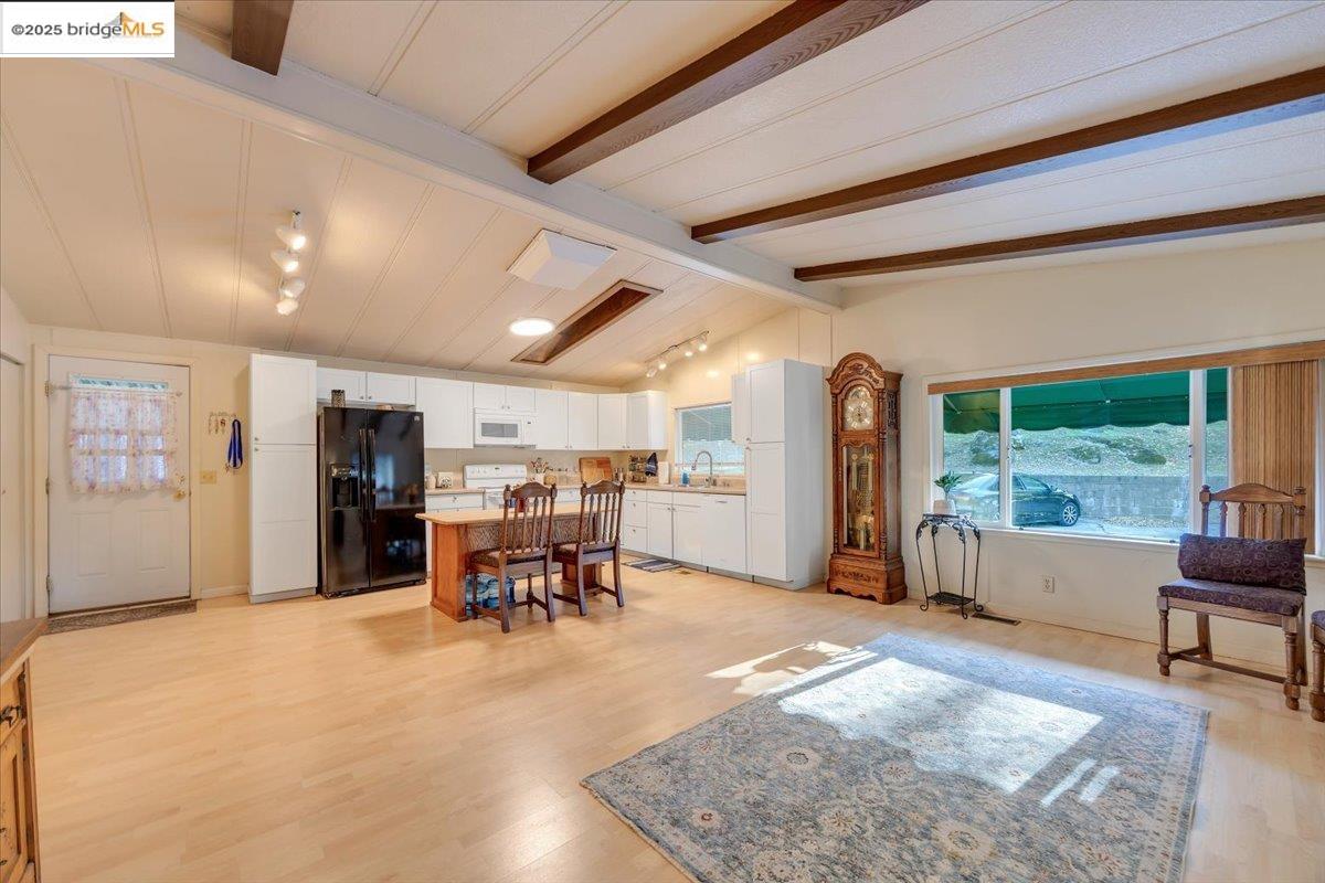 14192 Tuolumne Road, Unit 67 Sonora, CA 95370 - Photo 17 of 26 a living room with furniture and a large window