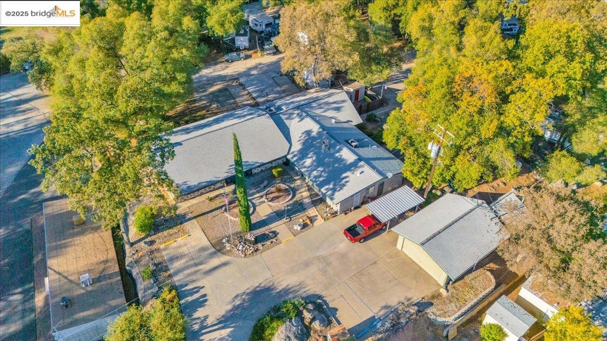 14192 Tuolumne Road, Unit 67 Sonora, CA 95370 - Photo 26 of 26 an aerial view of residential house with swimming pool