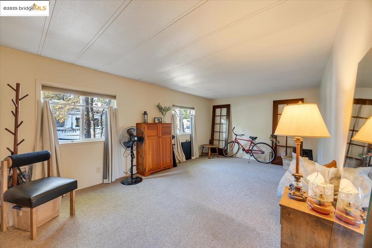 14192 Tuolumne Road, Unit 67 Sonora, CA 95370 - Photo 10 of 26 a view of a livingroom with furniture and a couch
