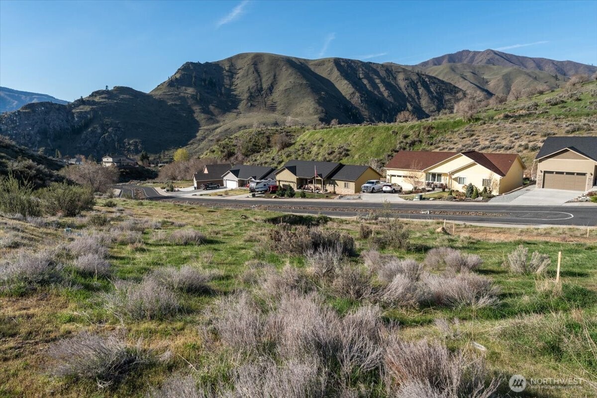 9988 Saska Way Entiat, WA 98822 - Photo 9 of 21 a view of a town with mountains in the background