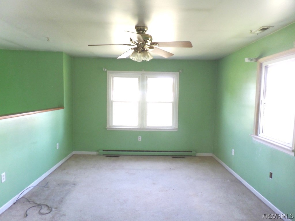 19002 Beaver Dam Road Beaverdam, VA 23015 - Photo 4 of 19 a view of room with window and ceiling fan