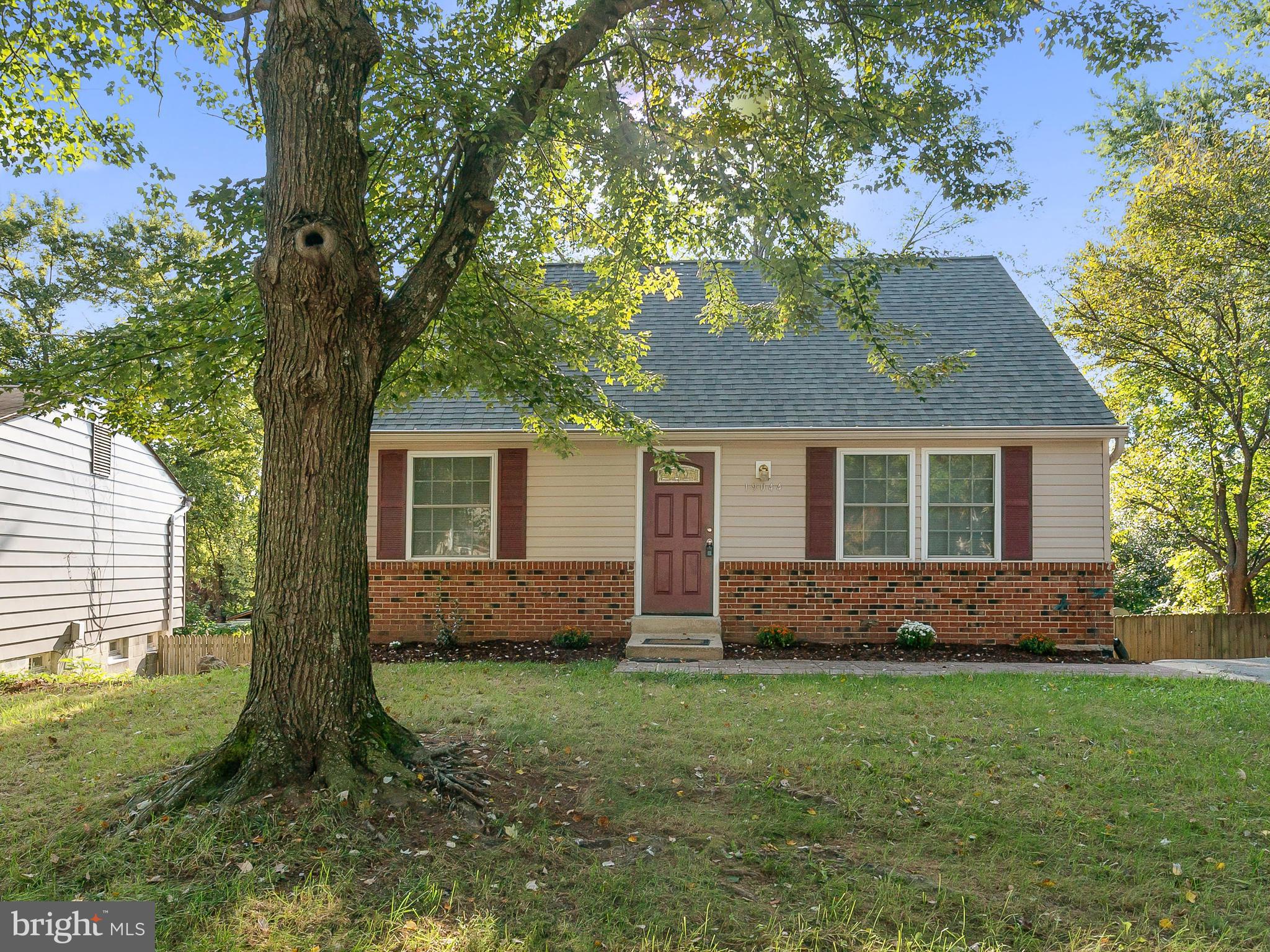 19044 Staleybridge Road Germantown, MD 20876 - Photo 2 of 30 front view of a house with a yard