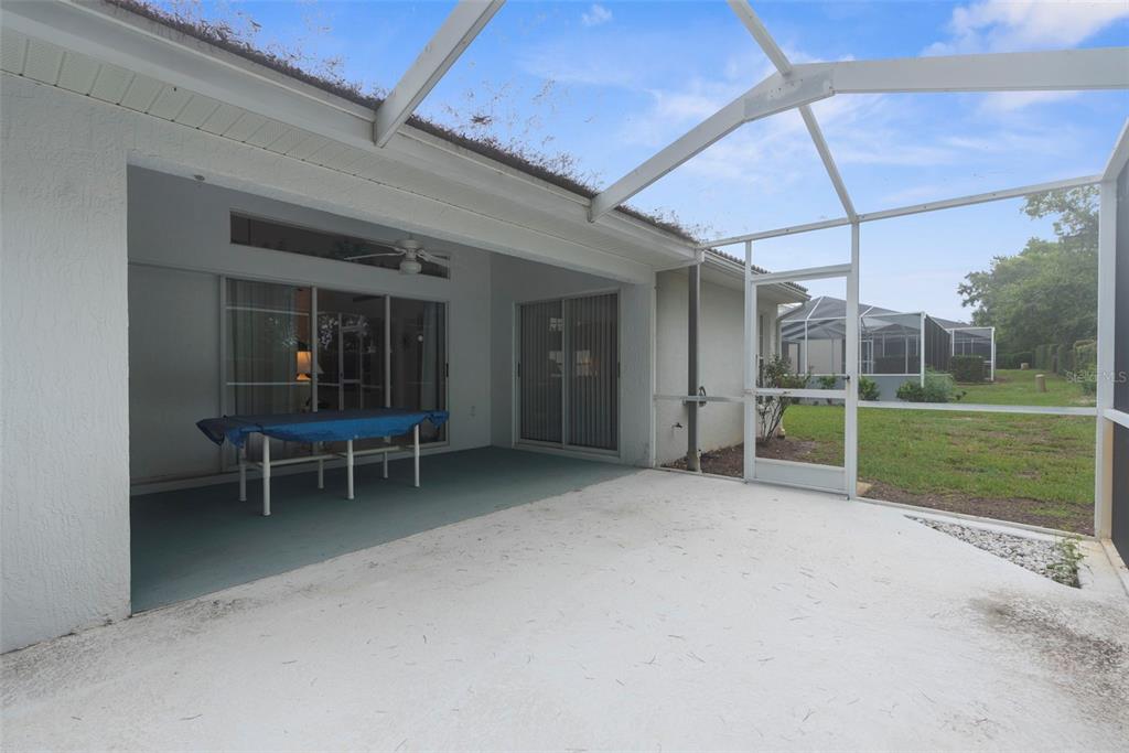 9426 Mississippi Run Weeki Wachee, FL 34613 - Photo 20 of 31 a view of a backyard with a patio and garden