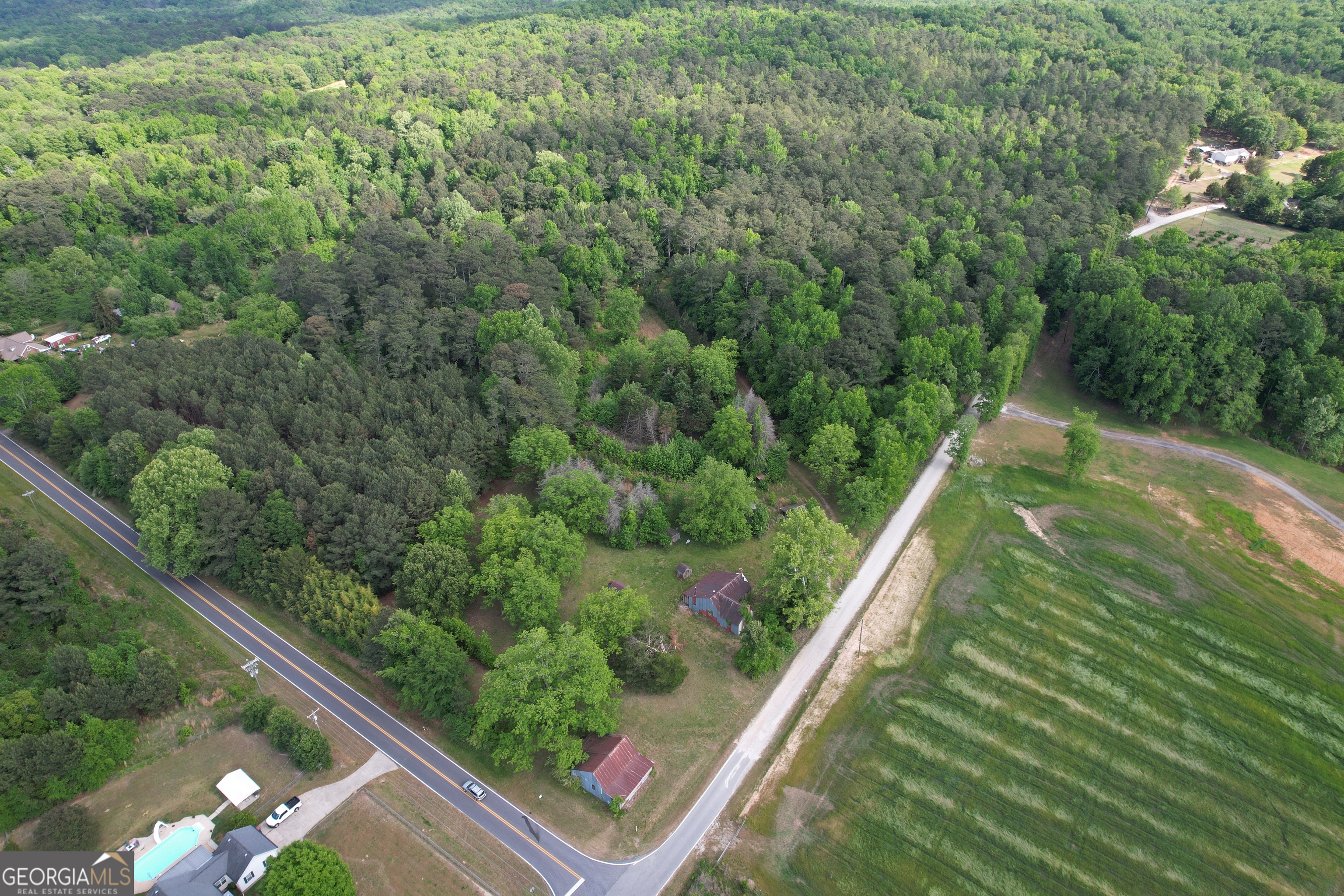 339 Oliver Road Meansville, GA 30256 - Photo 15 of 40 a view of a garden from a balcony