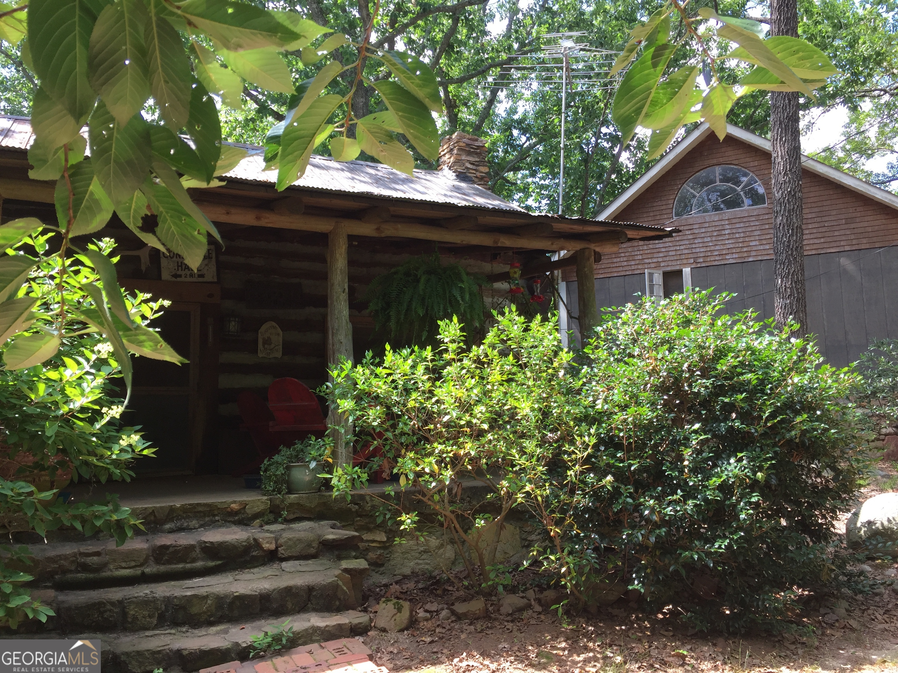 339 Oliver Road Meansville, GA 30256 - Photo 28 of 40 a wooden door in a yard