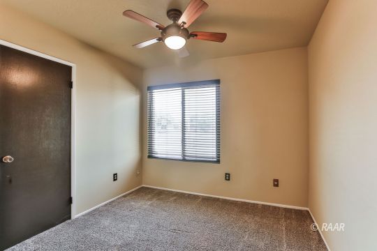 429 Debra Lane Ridgecrest, CA 93555 - Photo 10 of 34 a view of an empty room with a window
